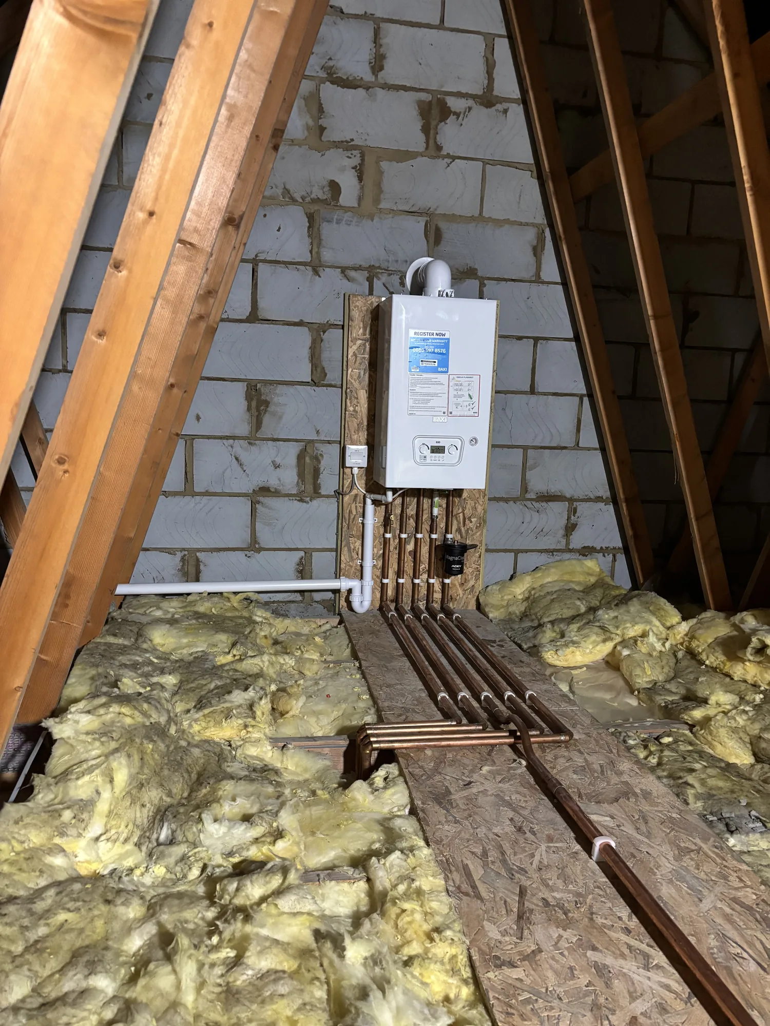 Vaillant ecoTEC plus system boiler mounted in the utility room